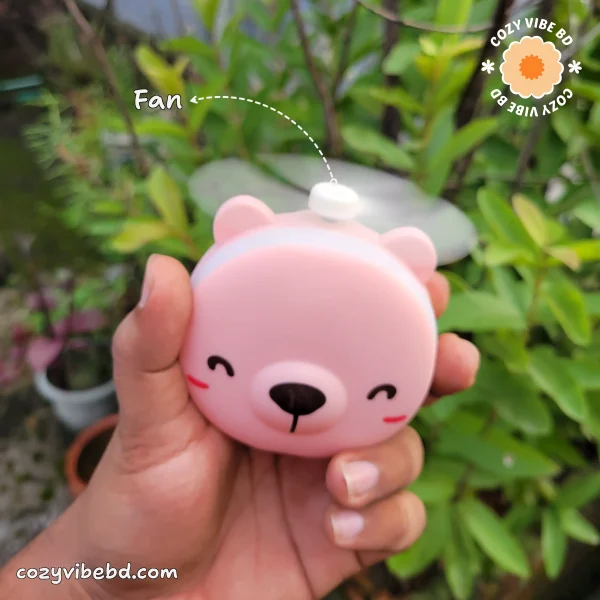 cute pocket makeup mirror with light and fan for girls showing the fan - image by cozy vibe bd