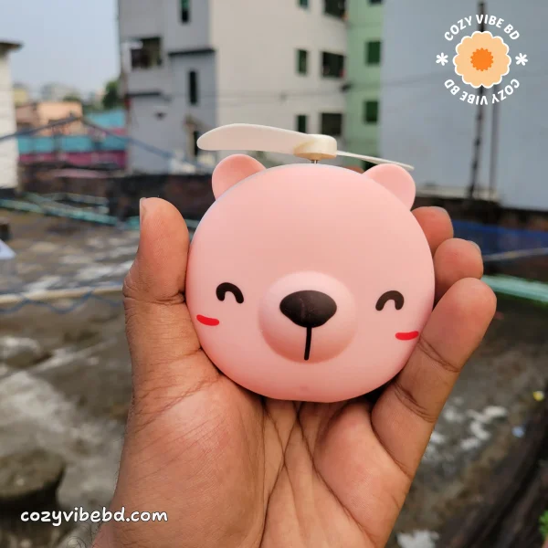 cute pocket makeup mirror with light and fan for girls showing the front view - image by cozy vibe bd