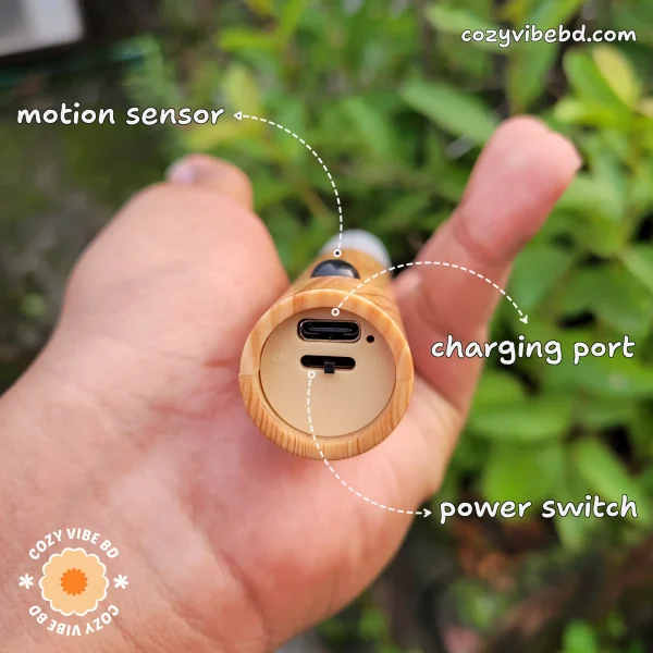 motion sensor light - backside image where charging port power switch and motion sensor is labeled with text - image by cozy vibe bd