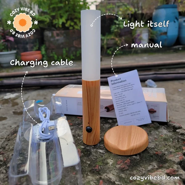 motion sensor light - full packaging image where charging cable and box and the product itself with all the accessories labeled with text - image by cozy vibe bd